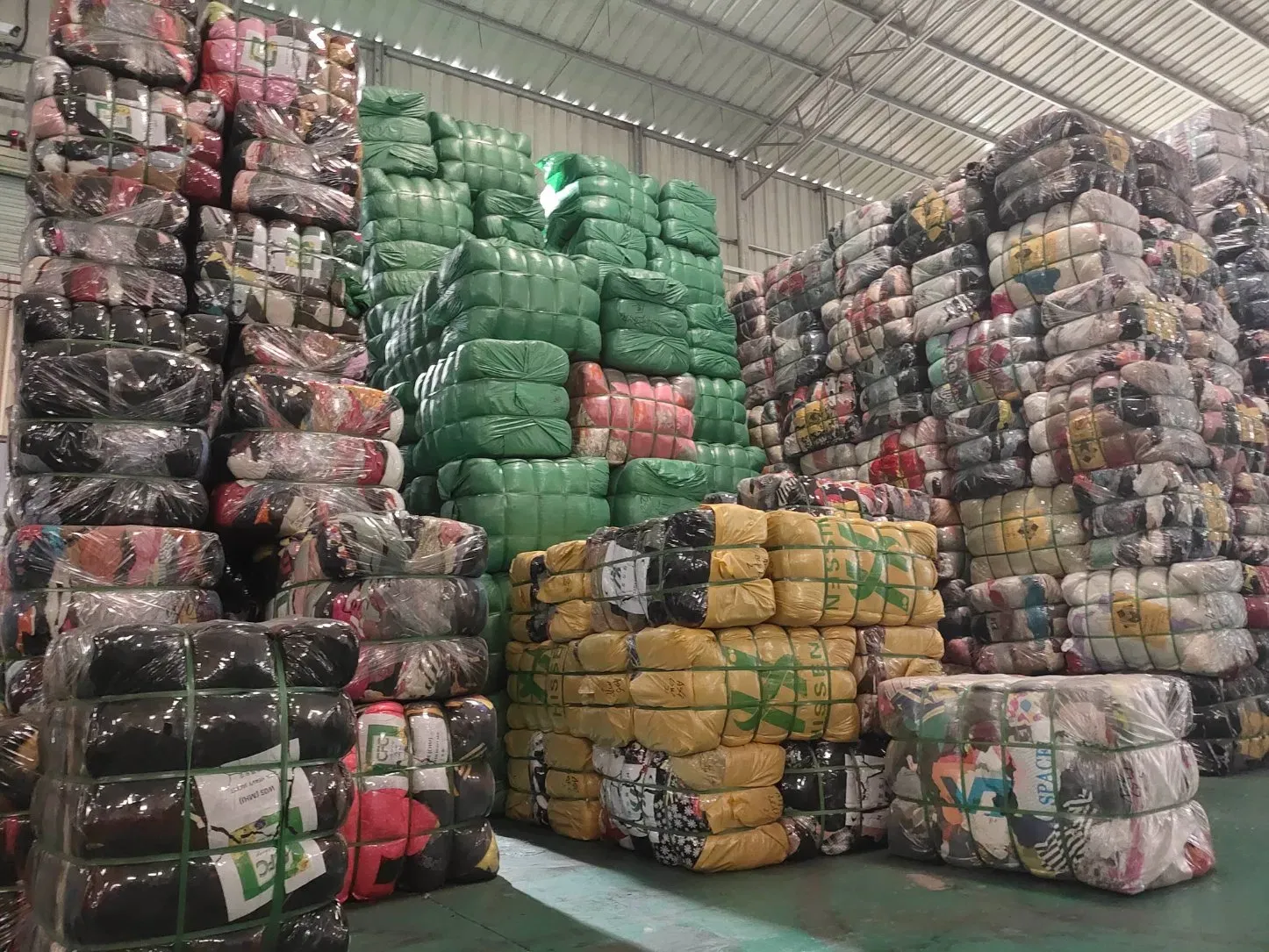 Packed bales staged for container loading ahead of an export shipment