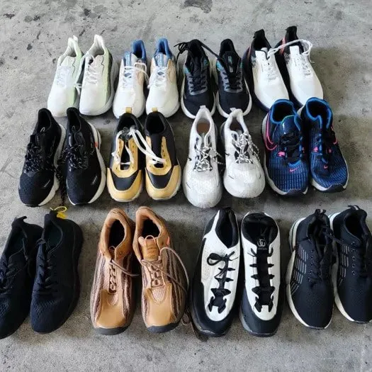 Mixed colors of athletic shoes on display.