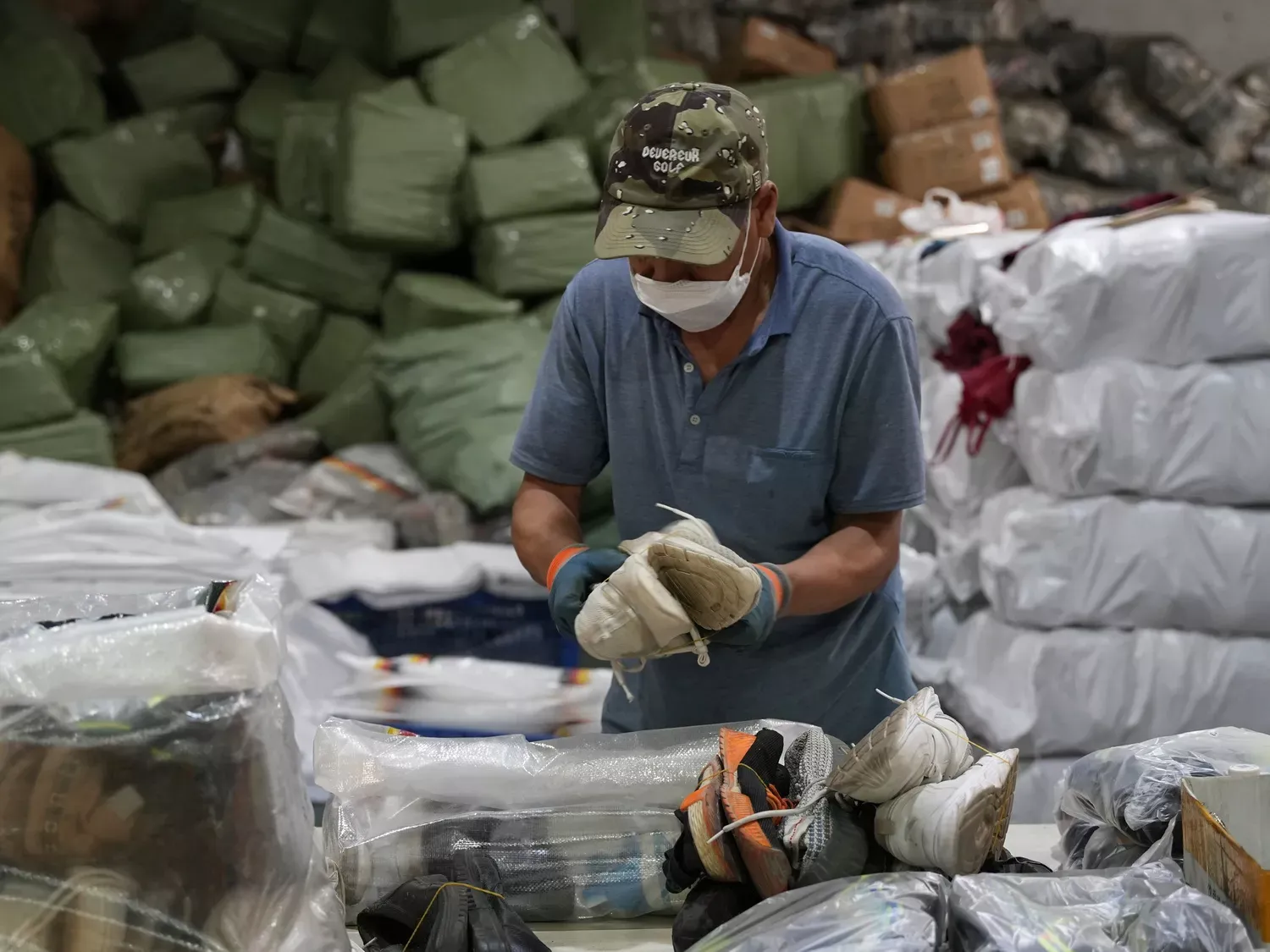 Used shoes bales from RossBoss, sorted and packed for wholesale distribution.