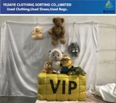 Used Clothing Bales from RossBoss, featuring a variety of plush toys on top, available in different colors and styles, perfect for B2B wholesale and export markets.