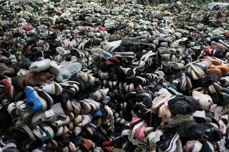 Mixed colors and styles of used shoes bales ready for wholesale export.
